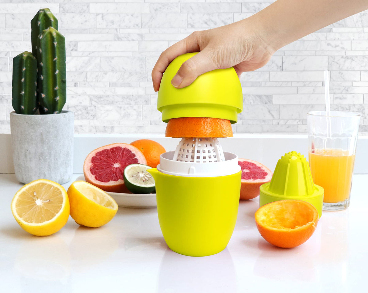 Two-cone design enables versatile juicing for citrus, grape, or pomegranate.