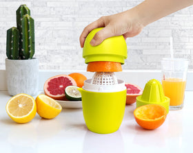Two-cone design enables versatile juicing for citrus, grape, or pomegranate.