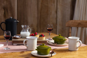 Le Creuset olive cocotte with bright glaze for flavorful portions