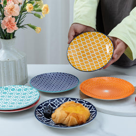 LEHAHA colorful round plates highlight a playful table setting, perfect for tea parties.