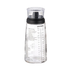 Leifheit glass dressing bottle 10oz with measurements for quick prep.