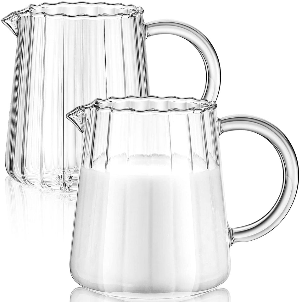 Leinuosen wave-style pitcher handle for comfortable grip and precise pouring.