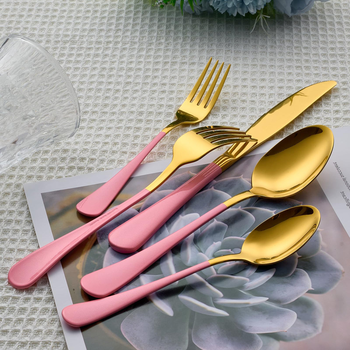 Lekoton 4-person set with durable 18/0 stainless steel and gold finish.