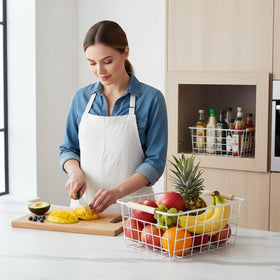 LeleCAT white wire baskets organizing pantry snacks and drinks neatly.