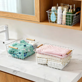 LeleCAT baskets used for toys, bath products, and storage in a cabinet.