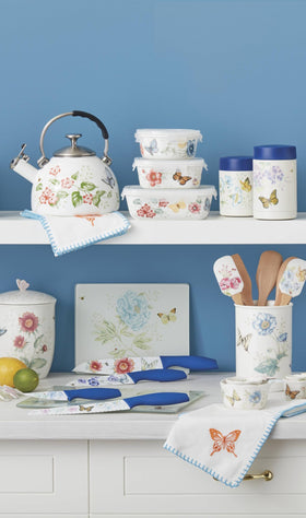 White milky glass backdrop highlights herbs and produce on Lenox board