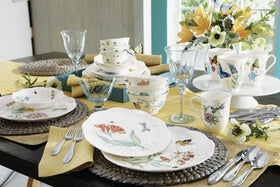 Lenox Butterfly Meadow closeup shows scalloped edges and garden motifs in vivid detail.