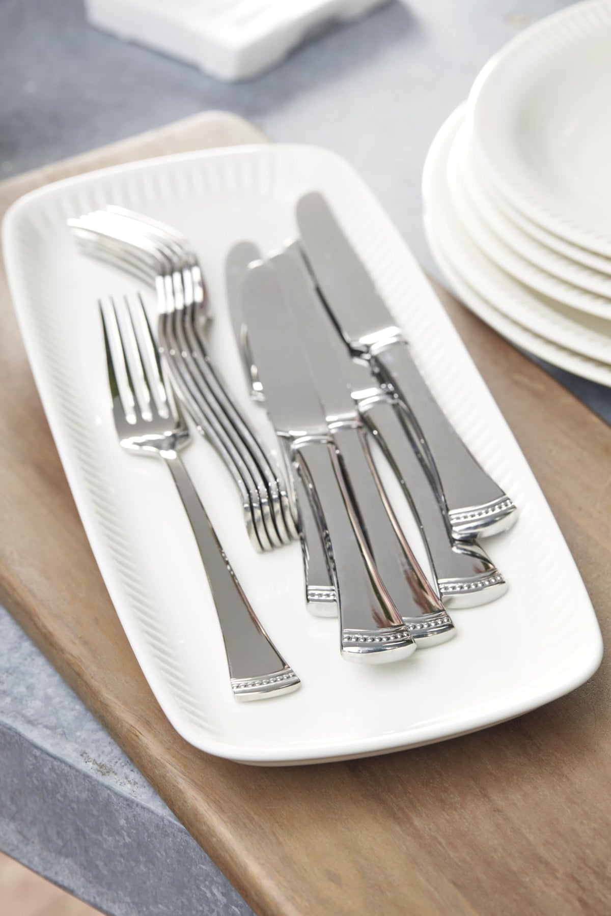 Lenox Portola service for four arranged with complete place settings for gatherings.