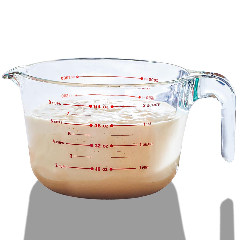 Le'raze 8-cup glass measuring cup front view with clear markings for precise measurement.