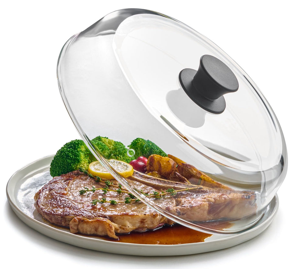 Le'raze glass microwave splatter cover 10-inch keeps plates clean during reheating.