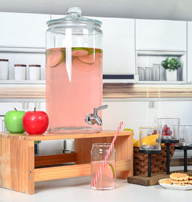 Le'raze tabletop setup featuring the 2-gallon dispenser at a party