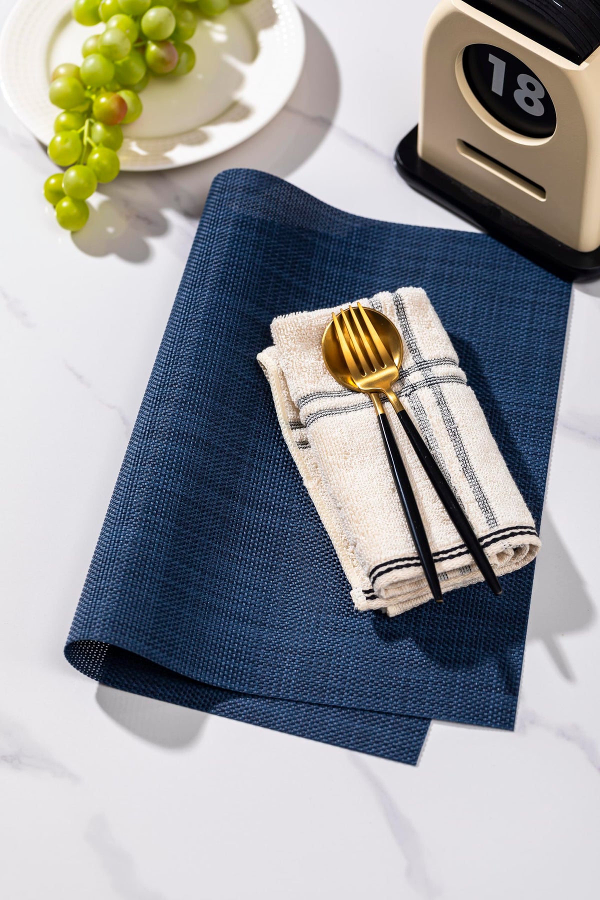 LEXMORE placemats close-up reveal thick feel from heavy-duty vinyl weave.