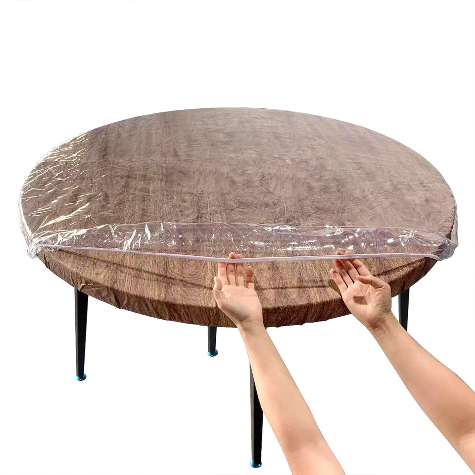 LIBERECOO clear round tablecloth on dining table protects against spills while showing natural wood surface.