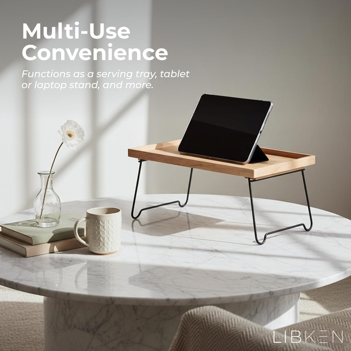 LIBKEN tray in a living room ready for serving or laptop use.