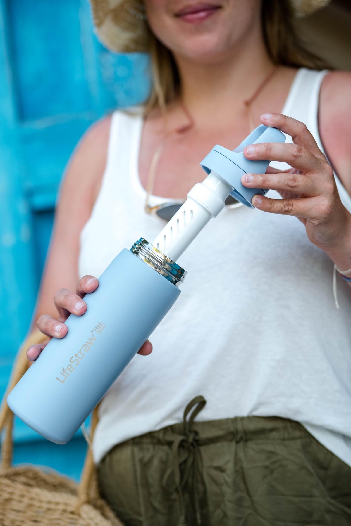 LifeStraw Go membrane filter detail shows barrier against bacteria and parasites