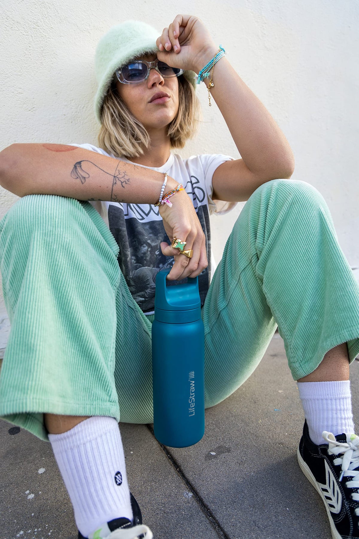 LifeStraw Go Series bottle during hiking, showcasing durability in rugged environments