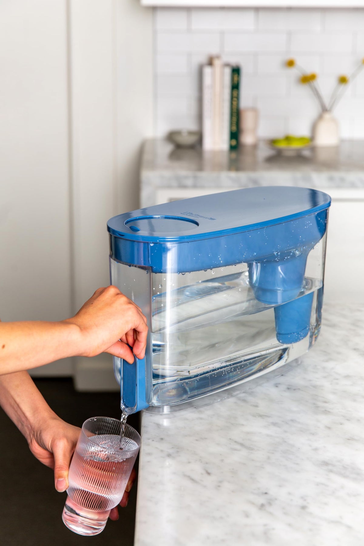 LifeStraw filter cartridge close-up shows carbon and ion-exchange work to reduce contaminants.