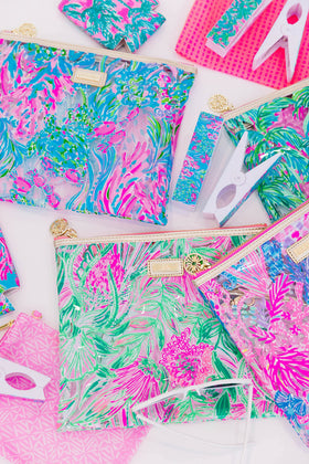 All-in-one beach day set bundles a zip pouch, two towel clips, and drink sleeve