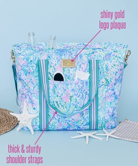 Lilly Pulitzer cooler bag top-zip design locks in cold for longer outings.