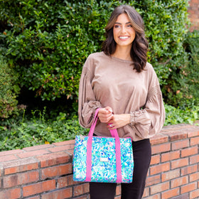 Two long straps offer comfortable carrying by hand or over the shoulder.