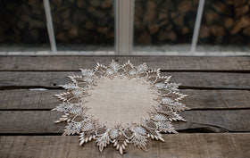 Formal dining setup featuring Linens, Art and Things lace doily.