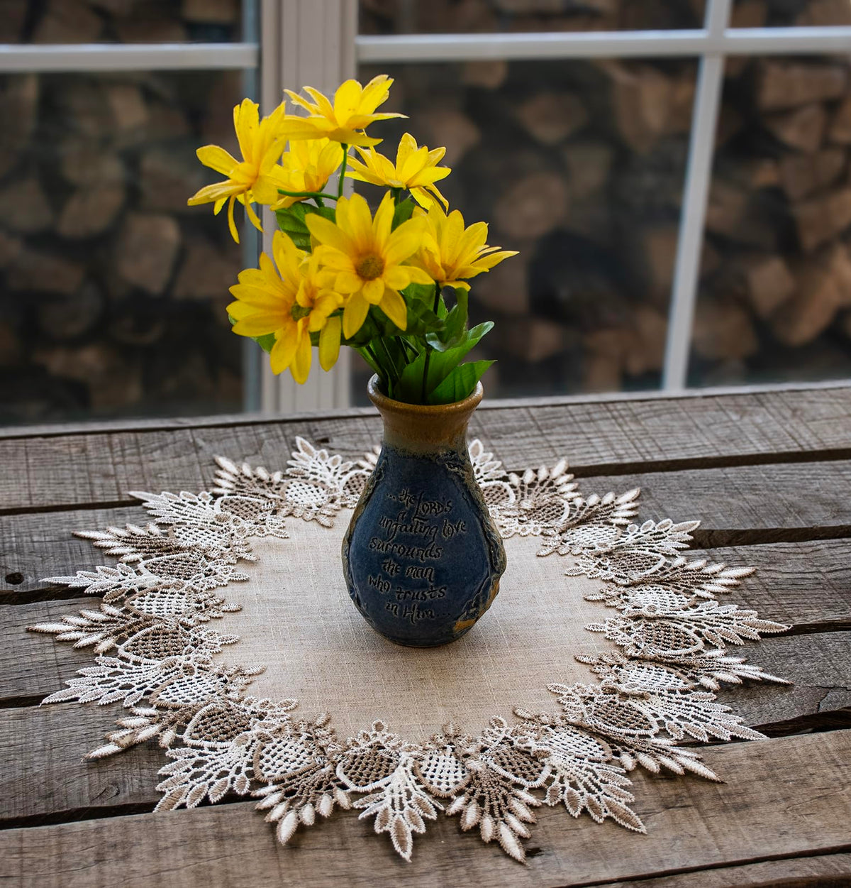 Lace doily displayed as table centerpiece by Linens, Art and Things.