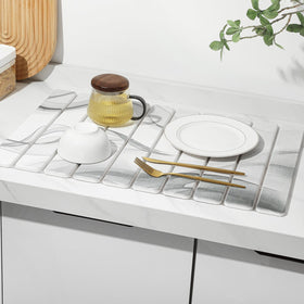 Linidcoud multipurpose mat serves as bath mat or plant saucer