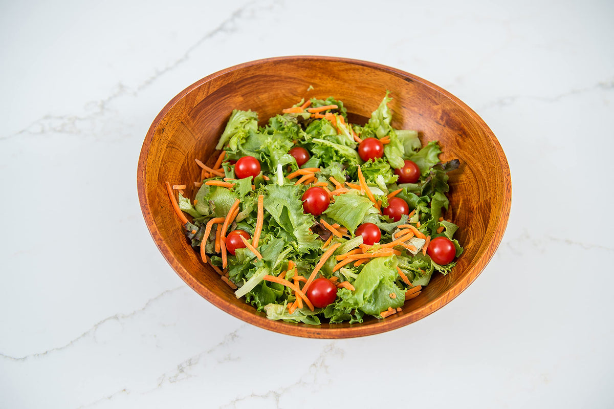 Versatile serving bowl for fruit, salads, or decorative displays.