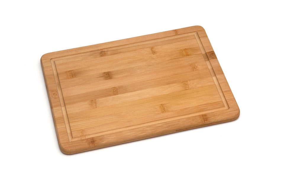 Lipper International bamboo cutting board with cork backing provides non-slip prep surface.