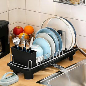 Liucocotos compact dish drying rack on countertop keeps small dishes organized and dry.