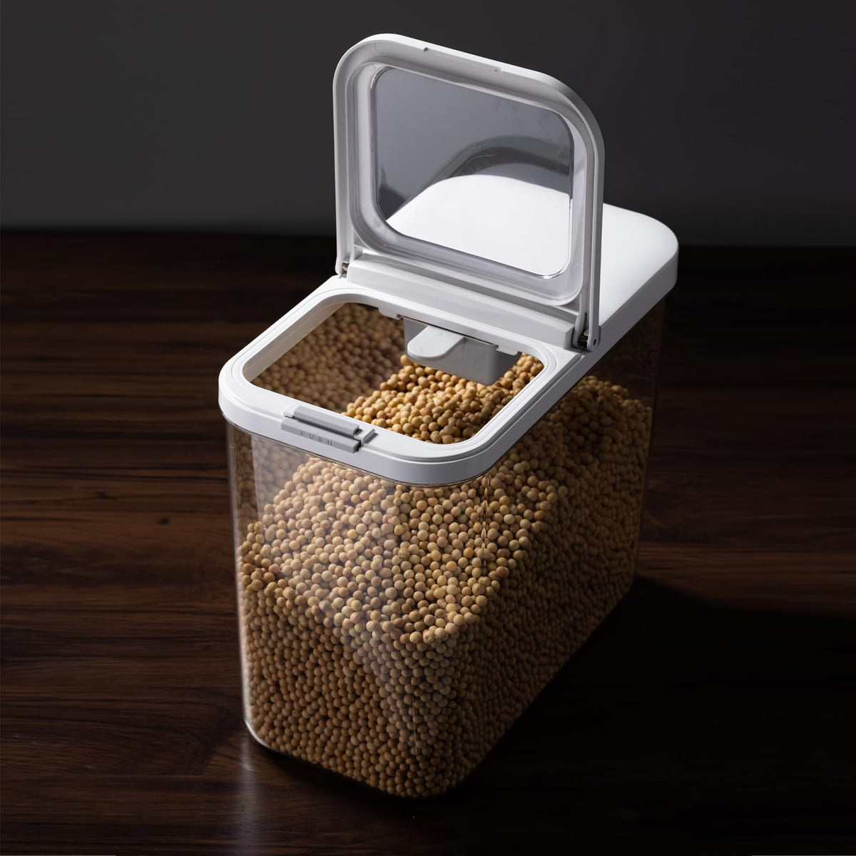 LivLab Mker rice dispenser with push-button lid for quick one-handed access.