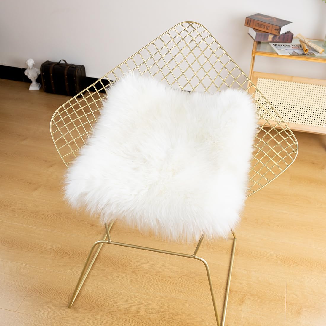 LLB sheepskin cushion styled for dining or restaurant chair setting.