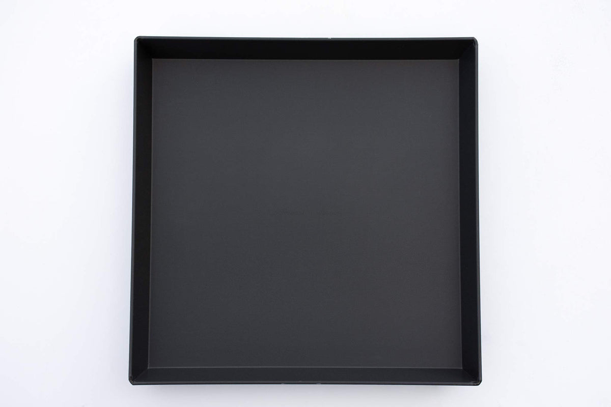PSTK coating close-up on Lloyd Pans pizza pan for stick resistance