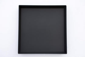 PSTK coating close-up on Lloyd Pans pizza pan for stick resistance
