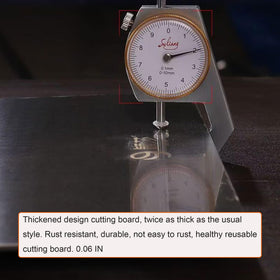 Lmuwecno titanium cutting board easy-clean surface dries quickly after washing.
