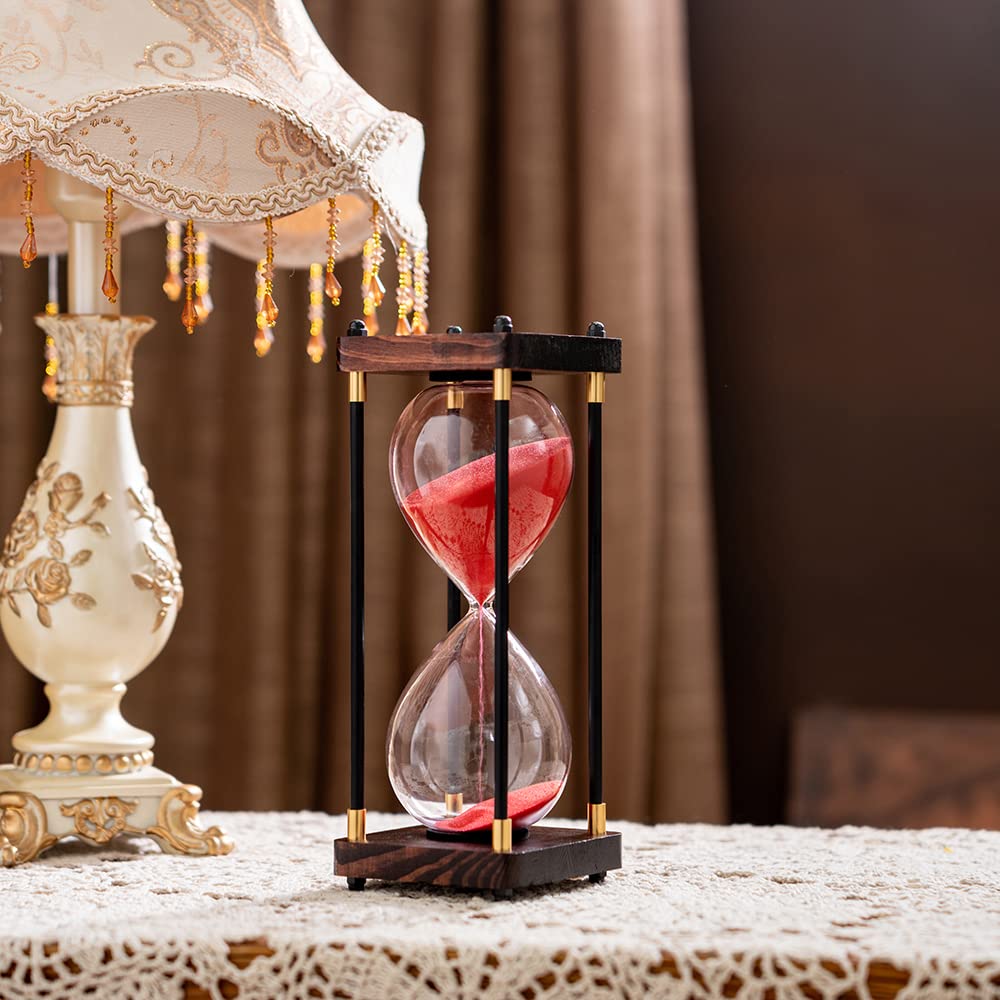 Lmzxmcy closeup sand-flow hourglass showing steady timer action for focus sessions.