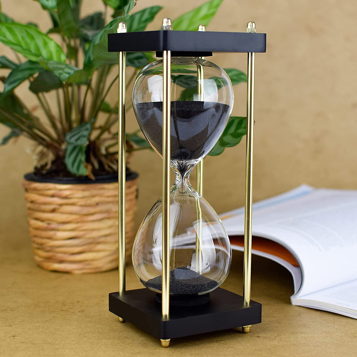 Lmzxmcy hourglass wooden frame on desk, a soothing timer for focus.