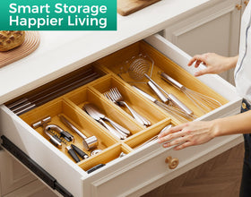 Lochantie stackable trays in drawer demonstrate customizable storage for utensils and tools.