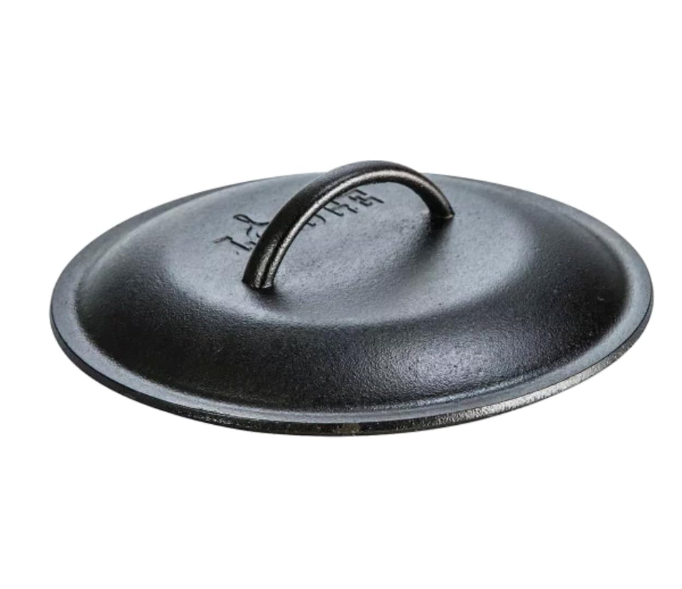 Lodge 10-1/4-inch lid with self-basting spikes improves moisture return during cooking.