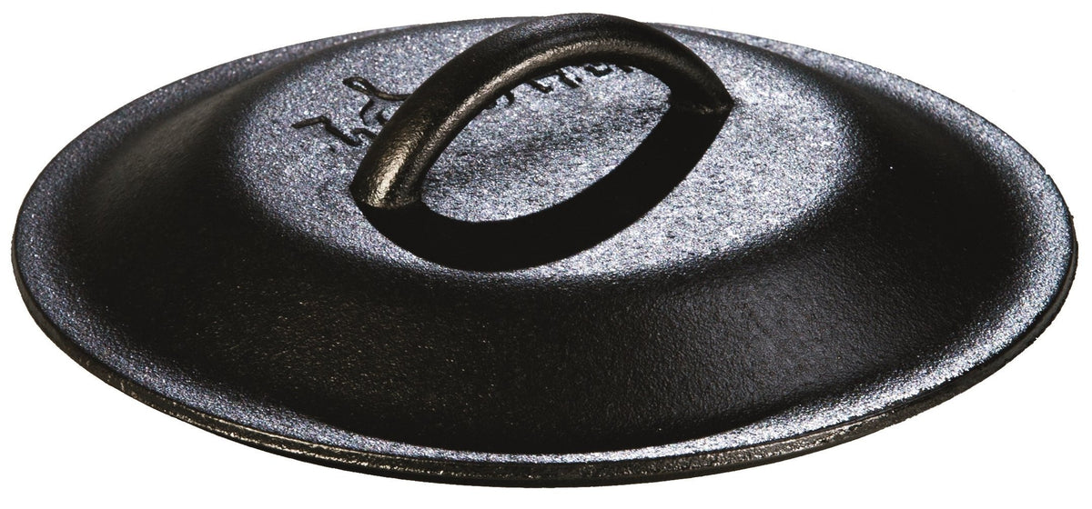 Lodge 8-inch cast iron lid with a sturdy handle, ideal for precise heat management.