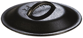 Lodge 8-inch cast iron lid with a sturdy handle, ideal for precise heat management.