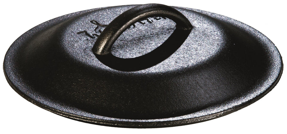 Lodge 8-inch cast iron lid with a sturdy handle, ideal for precise heat management.