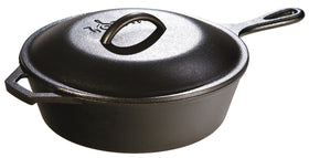 Lodge 8-inch cast iron lid interior highlights basting tips for even cooking.