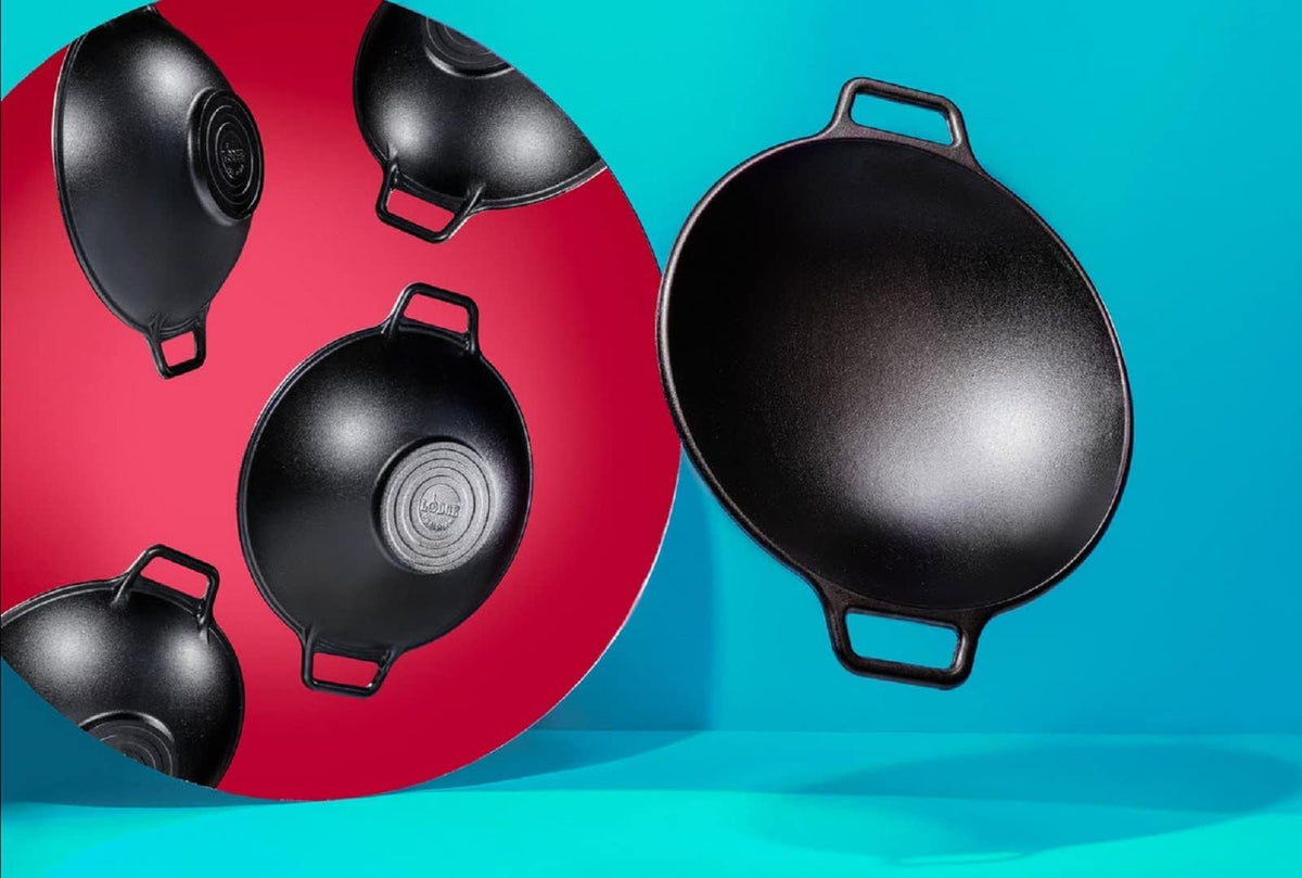 Lodge Bold 14-inch wok demonstrating heat retention for even cooking.
