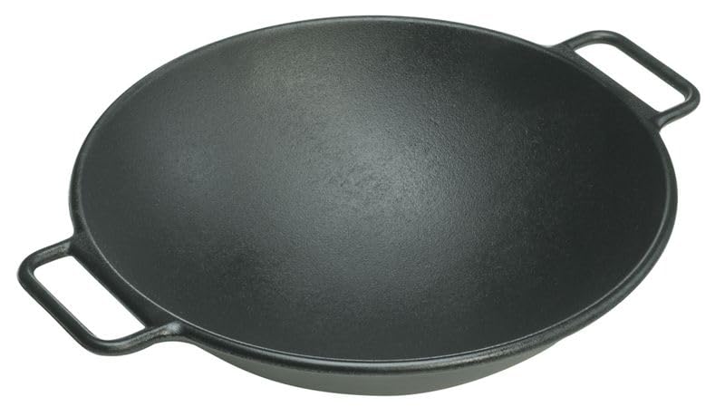 Lodge Bold 14-inch wok in-use on the stovetop for a sizzling stir-fry.