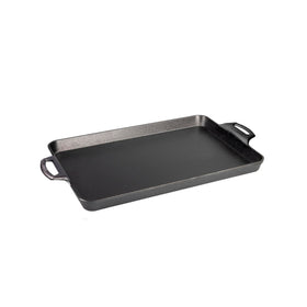 Lodge cast iron baking pan showcasing USA-made heritage and durable construction.