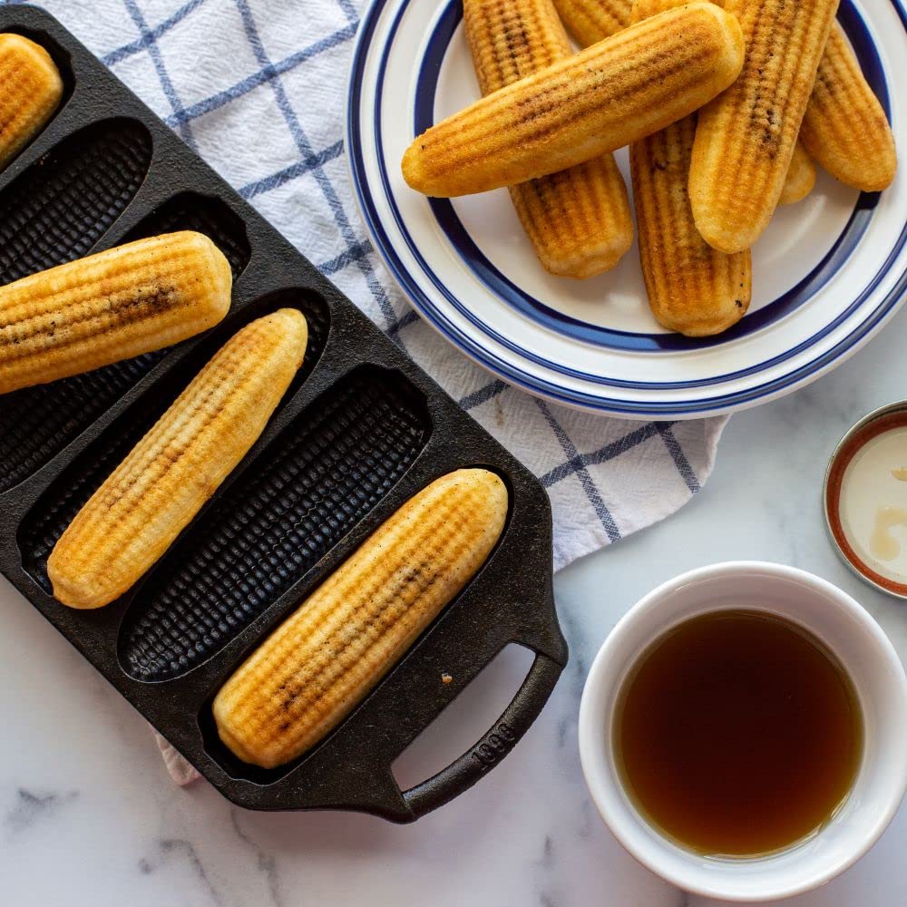 Lodge cornstick pan showing dual handles for batter-free pouring and safe handling.