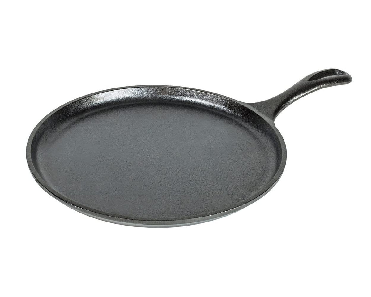 Lodge cast iron griddle on a stovetop delivering even browning for tortillas and sandwiches.