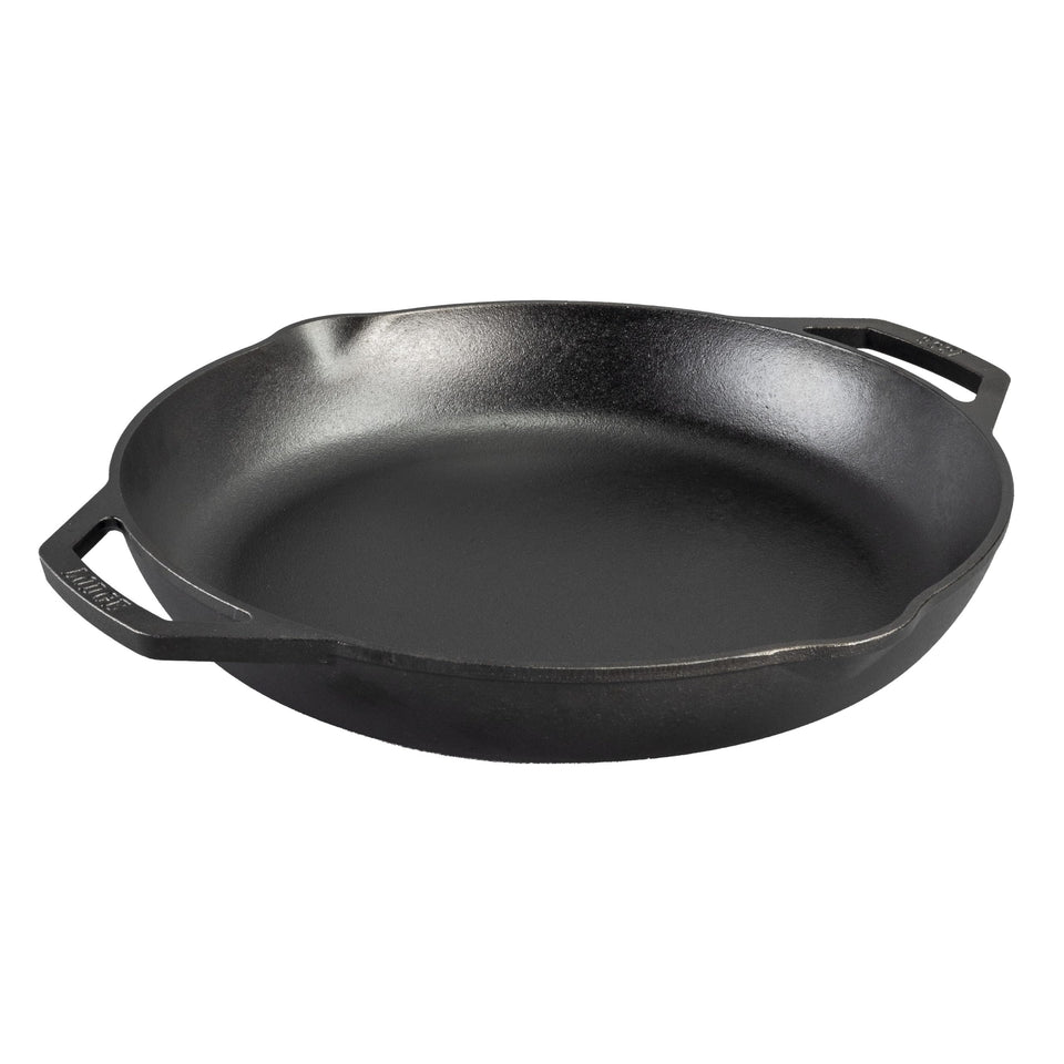 Lodge Chef Collection 14-inch skillet top view highlighting dual handles and casting for even browning.