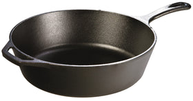Lodge deep skillet with teardrop handle on the stove for even searing